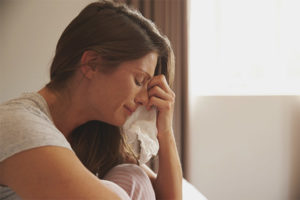 Increased tearfulness in women